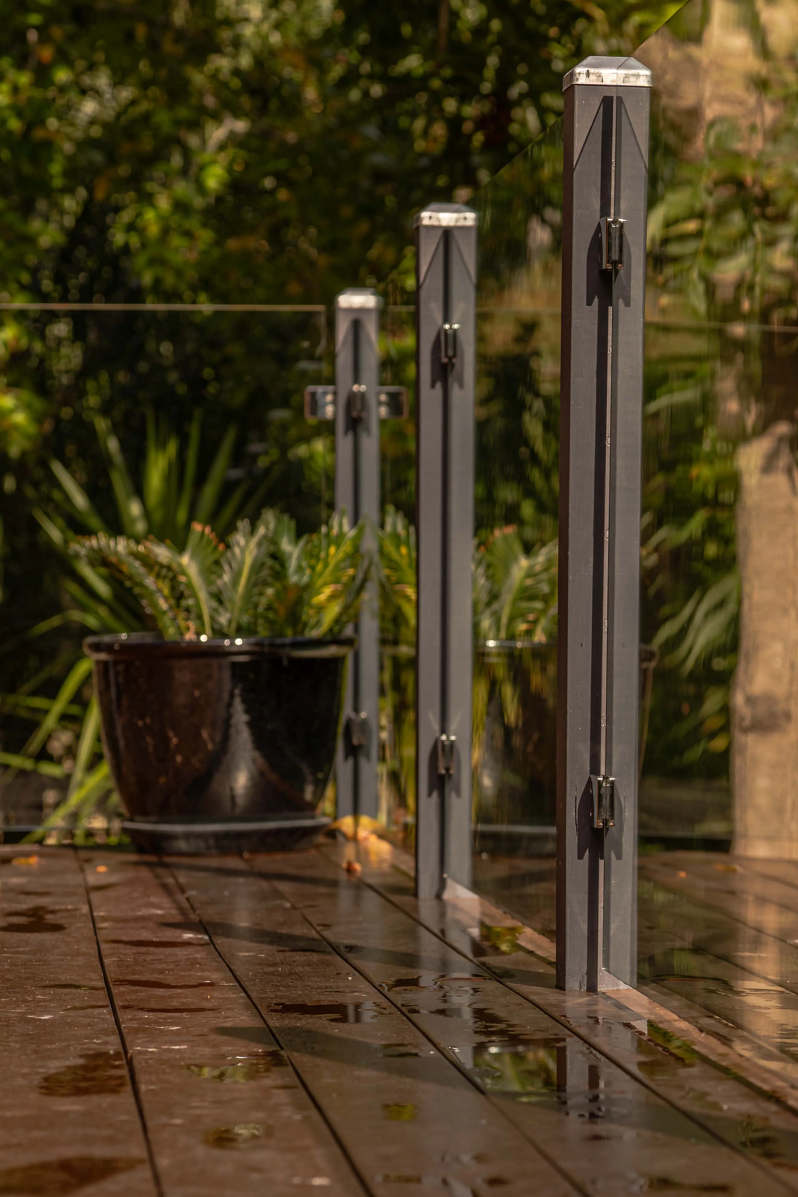 Glass balustrade deck garden portrait.