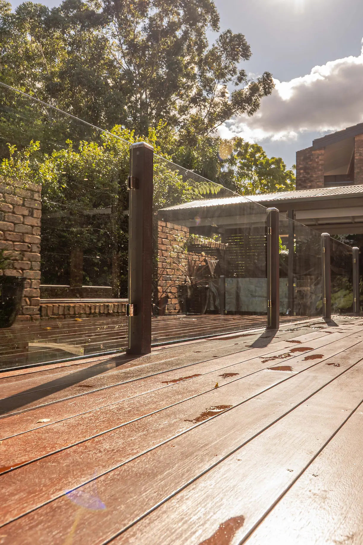 Glass balustrade timber deck portrait.