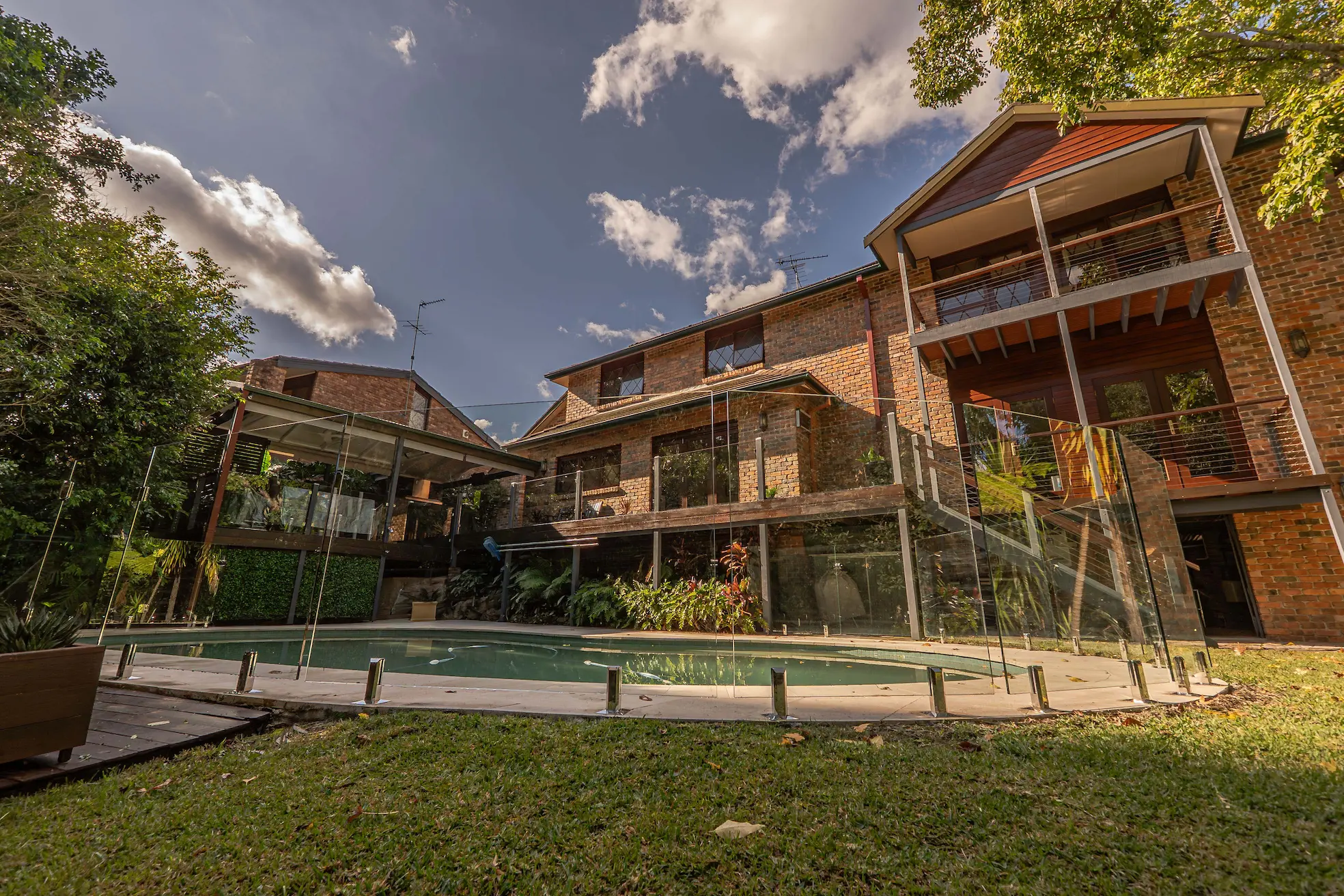 Pool glass fencing house lawn alternate.