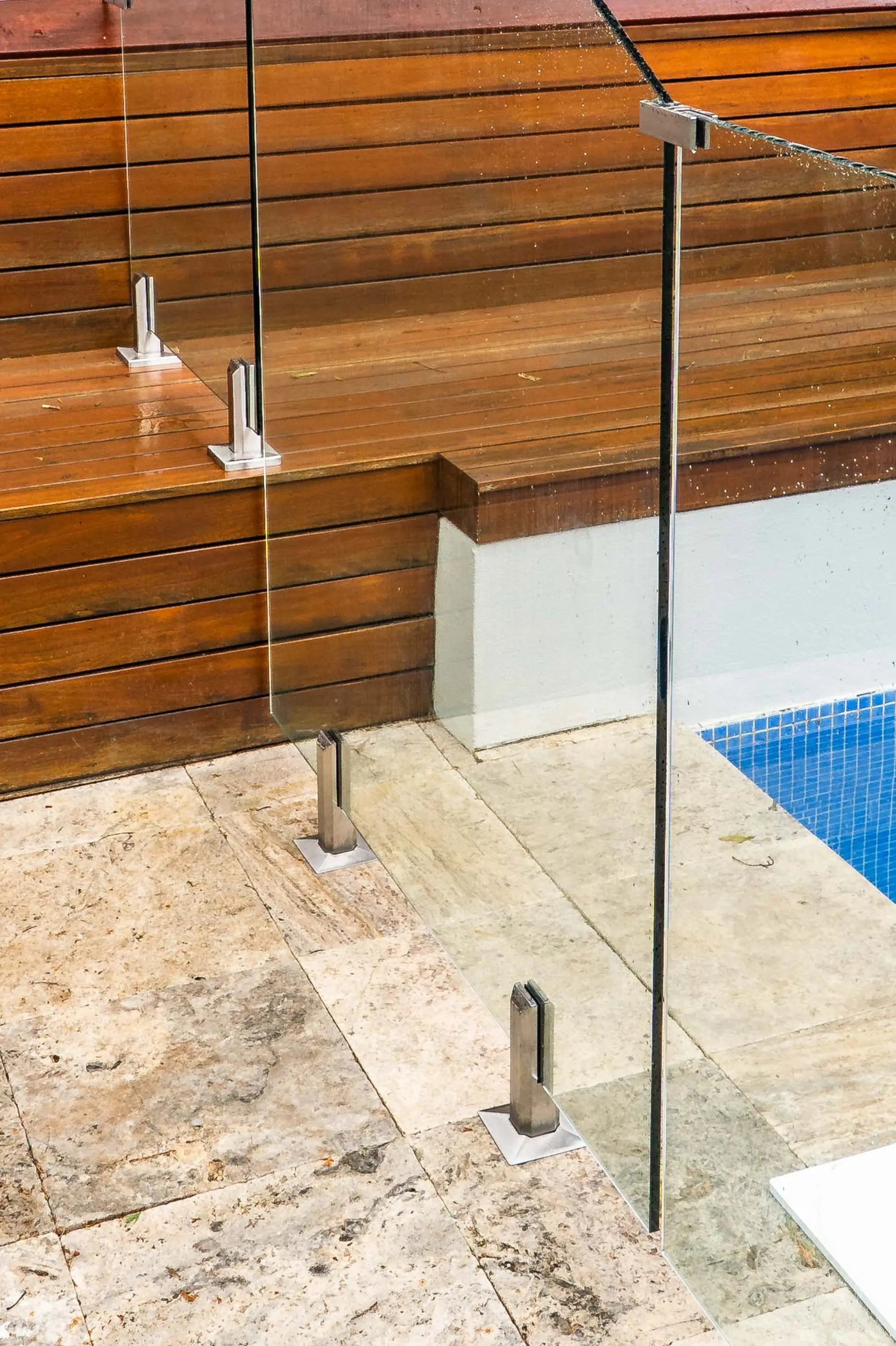 Glass pool fence bench spigots.