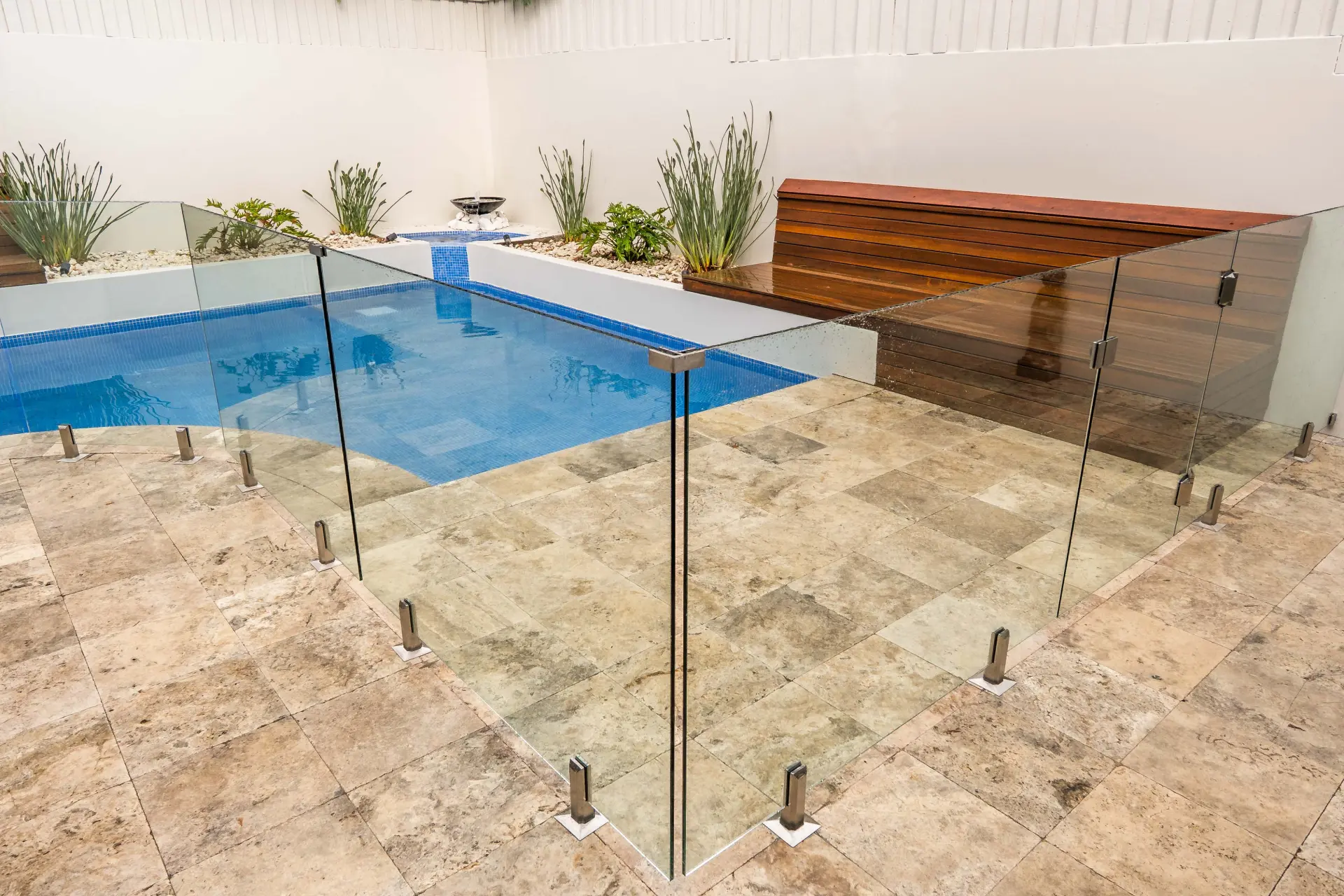 Glass pool fence corner bench.