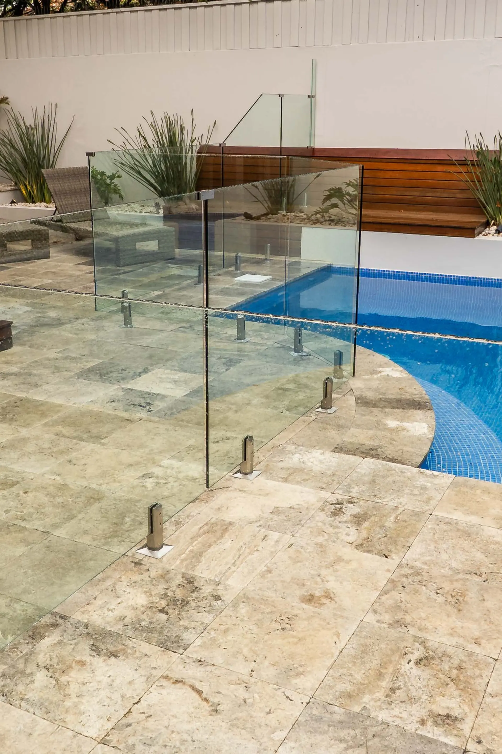 Glass pool fence curved edge.