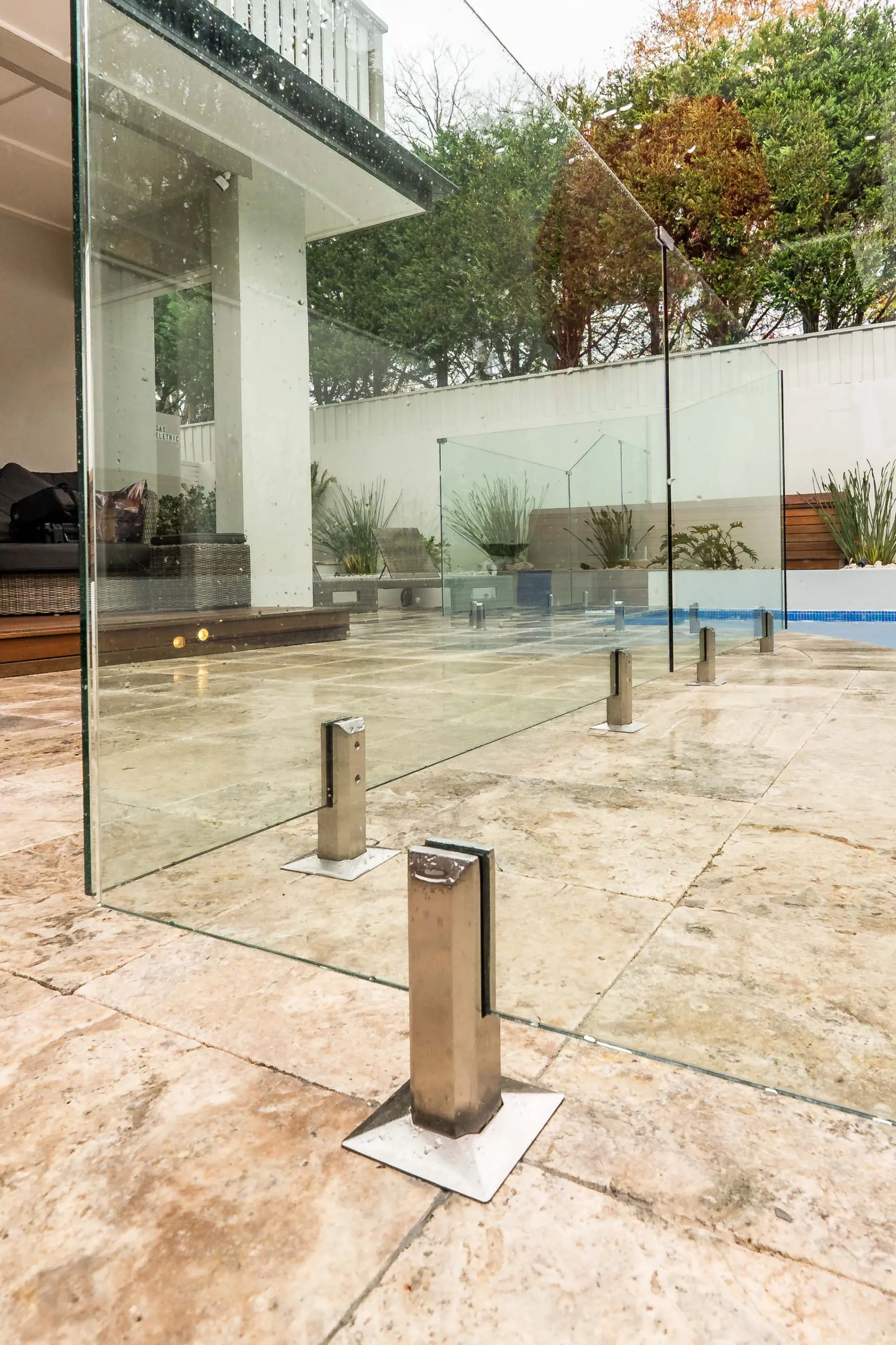 Glass pool fence ground level.