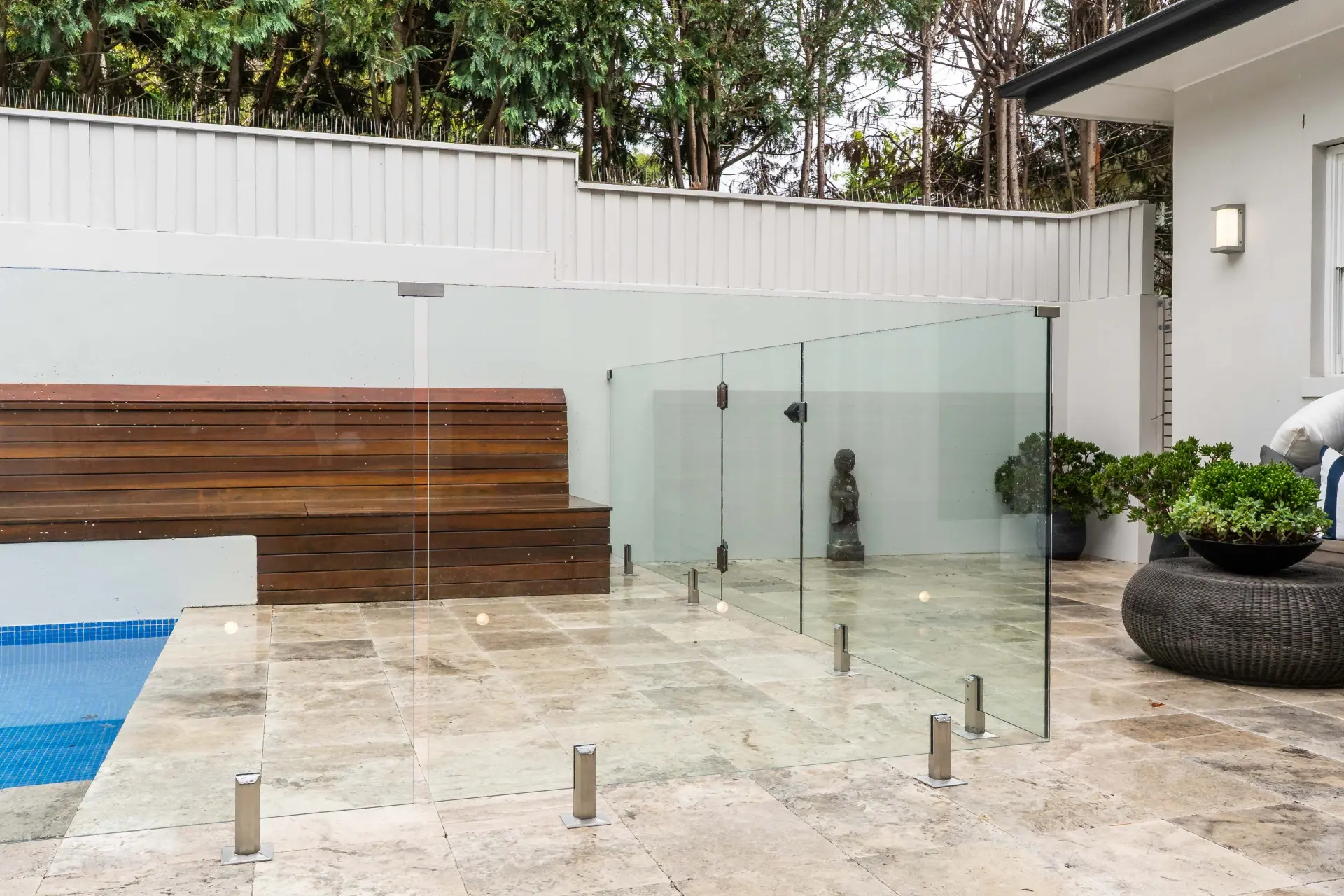 Glass pool fence house terrace.