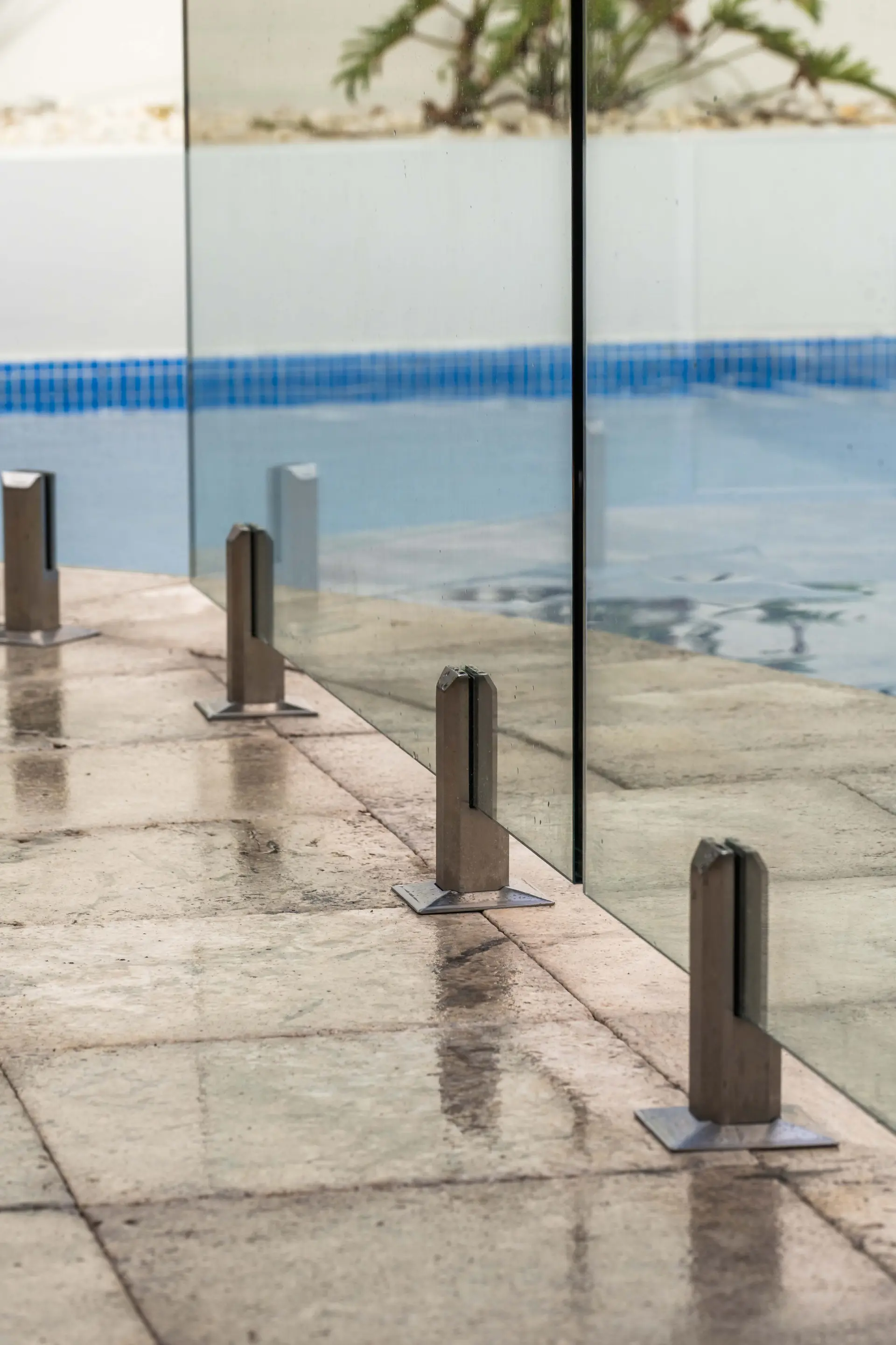 Glass pool fence spigot line.