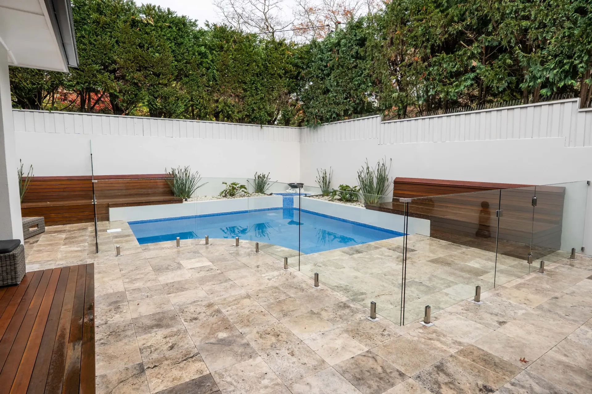 Pool glass fencing courtyard wide.